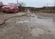 Locuitorii din Valeapai revoltați că un pod este stricat de camioanele cu lemne FOTO